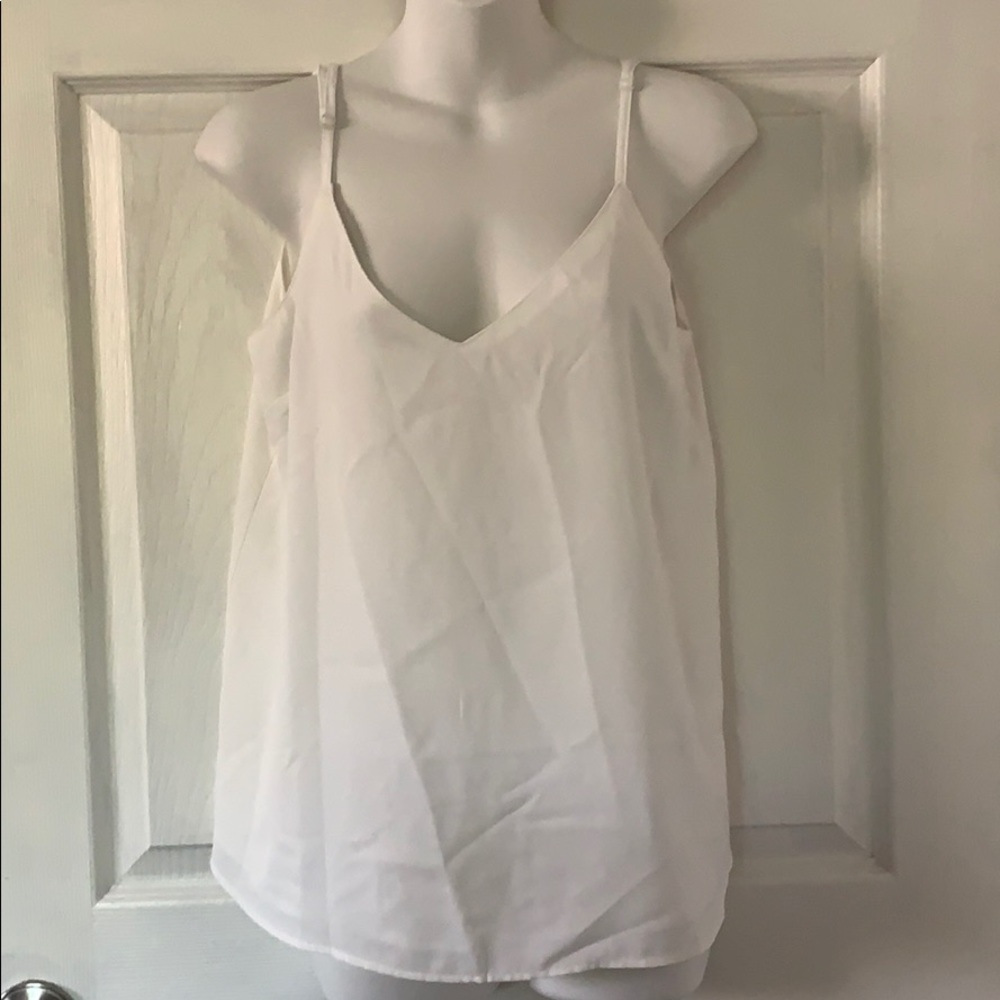 White sleeveless top